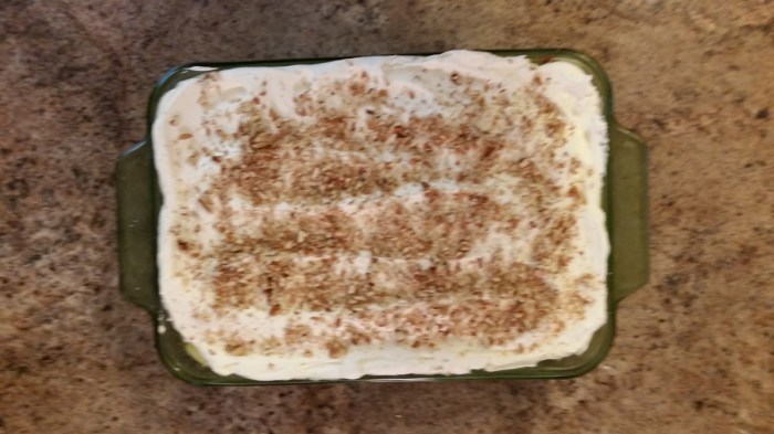 Top with whipped topping and chopped nuts