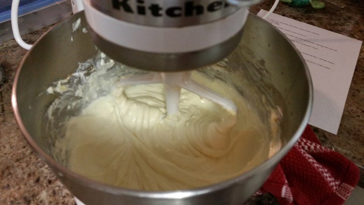 Mixing cream cheese and eggs