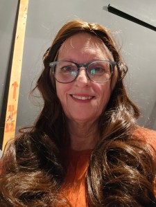 Female in long brown wig